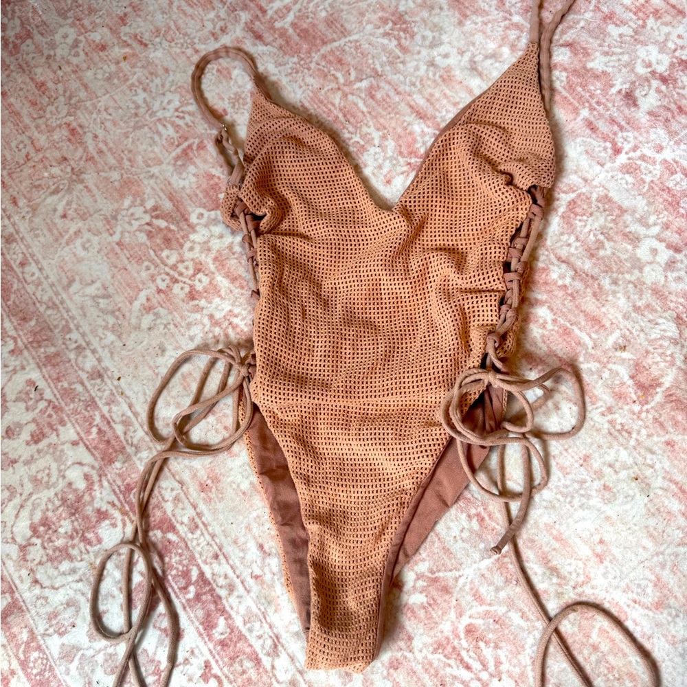 Blue life one piece size tie up bikini.